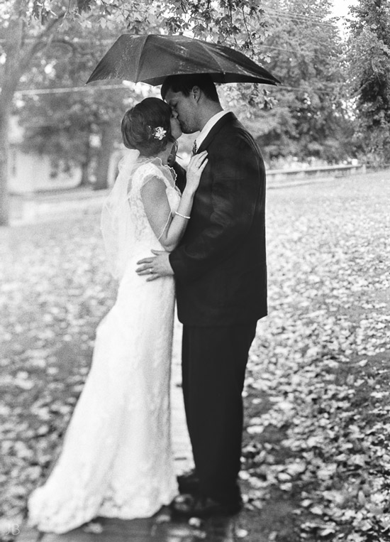 Kelley anniversary photoshoot on rainy autumn fall day with umbrella at Mary Baldwin College on the Terrace