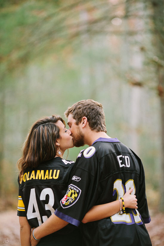 engagement session in the woods, surrounding a fire with smores and flannel in autumn