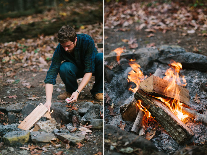 engagement session in the woods, surrounding a fire with smores and flannel in autumn