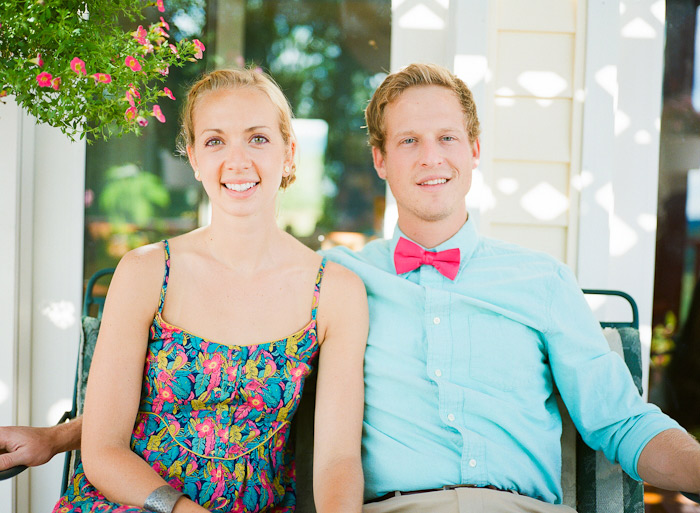 enjoying lemonade on porch under a vine summer engagement session shot on Fuji 400H