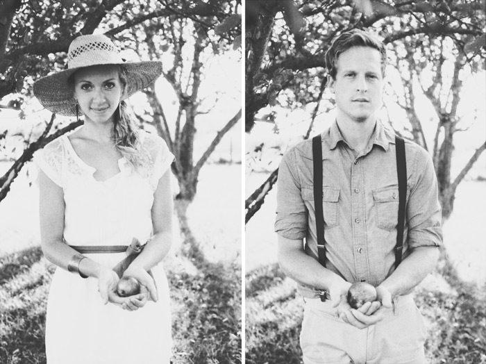 dreamy vintage engagement in an orchard kiss behind vintage straw hat camera color film fuji400h medium format vibrant