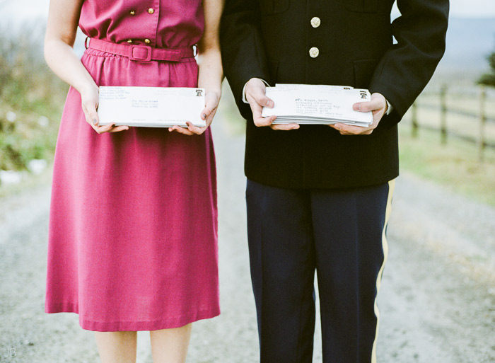 fuji 400h military couple in uniform with letters they wrote to each other 1950s farmhouse engagement photo shoot