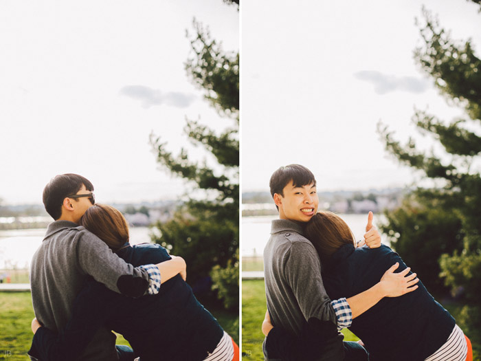 couple kissing in the cherry blossoms in Washington DC on the Tidal Basin