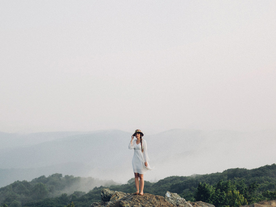 bridal shoot on a mountaintop - the vastness of nature surrounds
