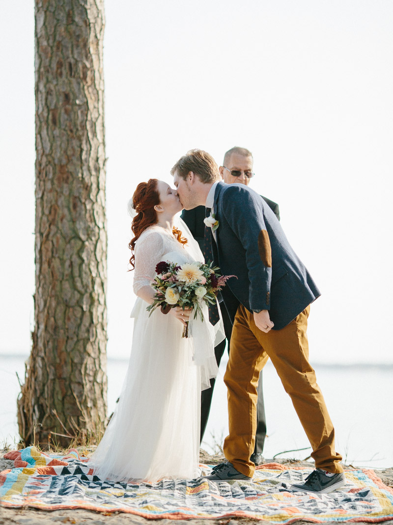 film photos of private intimate backyard wedding on the chesapeake bay in kilmarnock Virginia