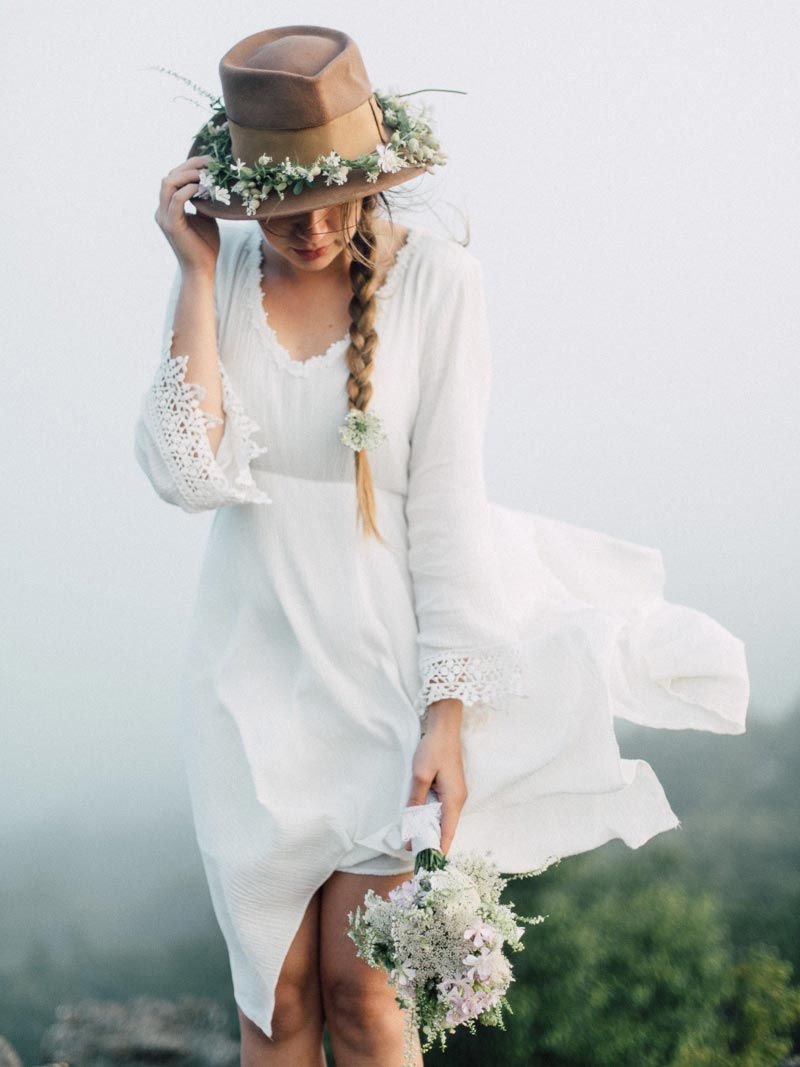 free spirit mountain bridal portraits session at sunrise with foraged wildflower bouquet