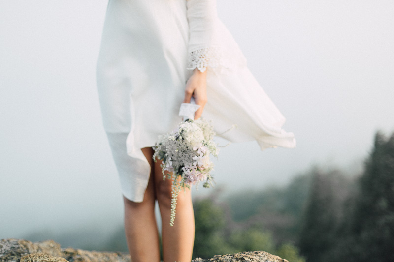 free spirit mountain bridal portraits session at sunrise with foraged wildflower bouquet