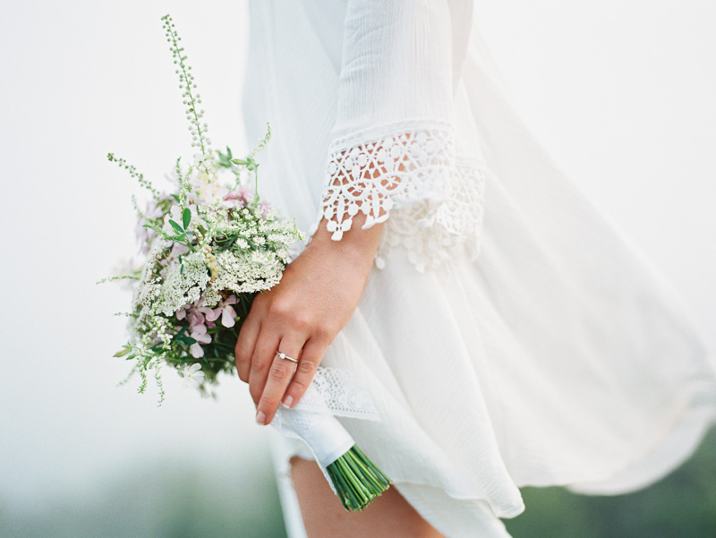 free spirit mountain bridal portraits session at sunrise with foraged wildflower bouquet