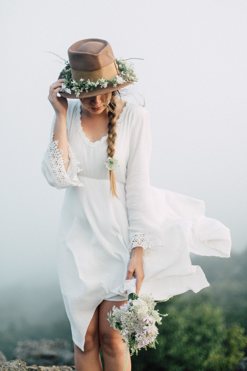 free spirit mountain bridal portraits session at sunrise with foraged wildflower bouquet