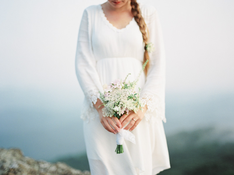 free spirit mountain bridal portraits session at sunrise with foraged wildflower bouquet