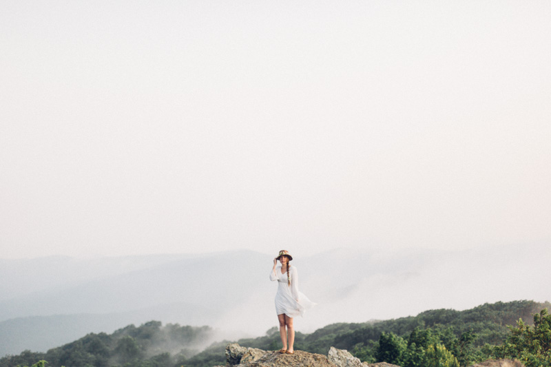 free spirit mountain bridal portraits session at sunrise with foraged wildflower bouquet