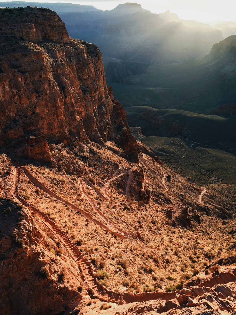 south kaibab trail below the grand canyon's south rim at sunrise rim to river to rim hike