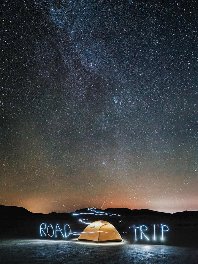 light painting our camp under the stars in the joshua tree BLM land near Joshua tree national park