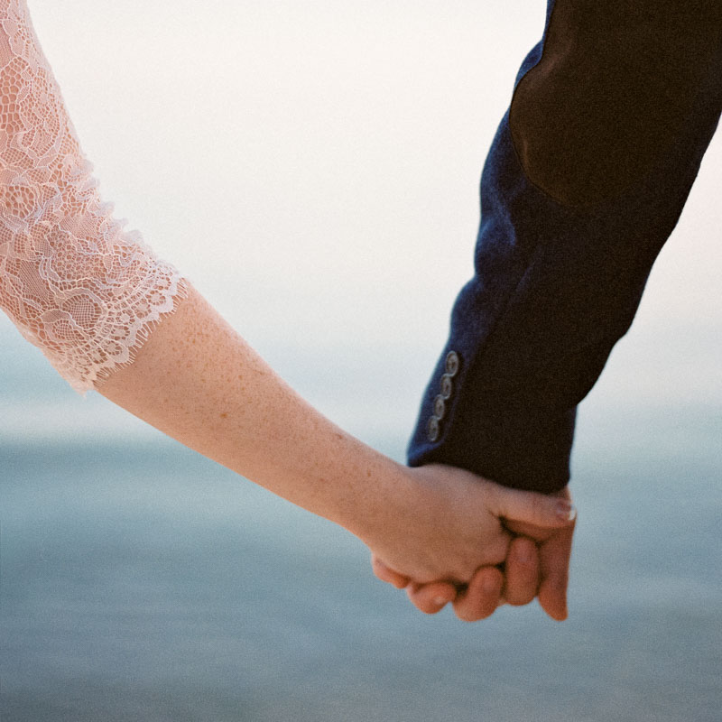 closeup of bride and groom holding hands kodak portra 400