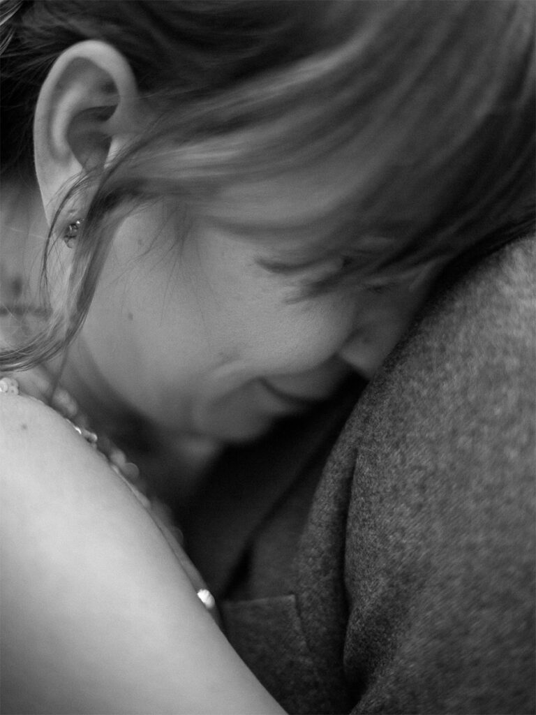 bride and groom snuggle up for a quiet moment