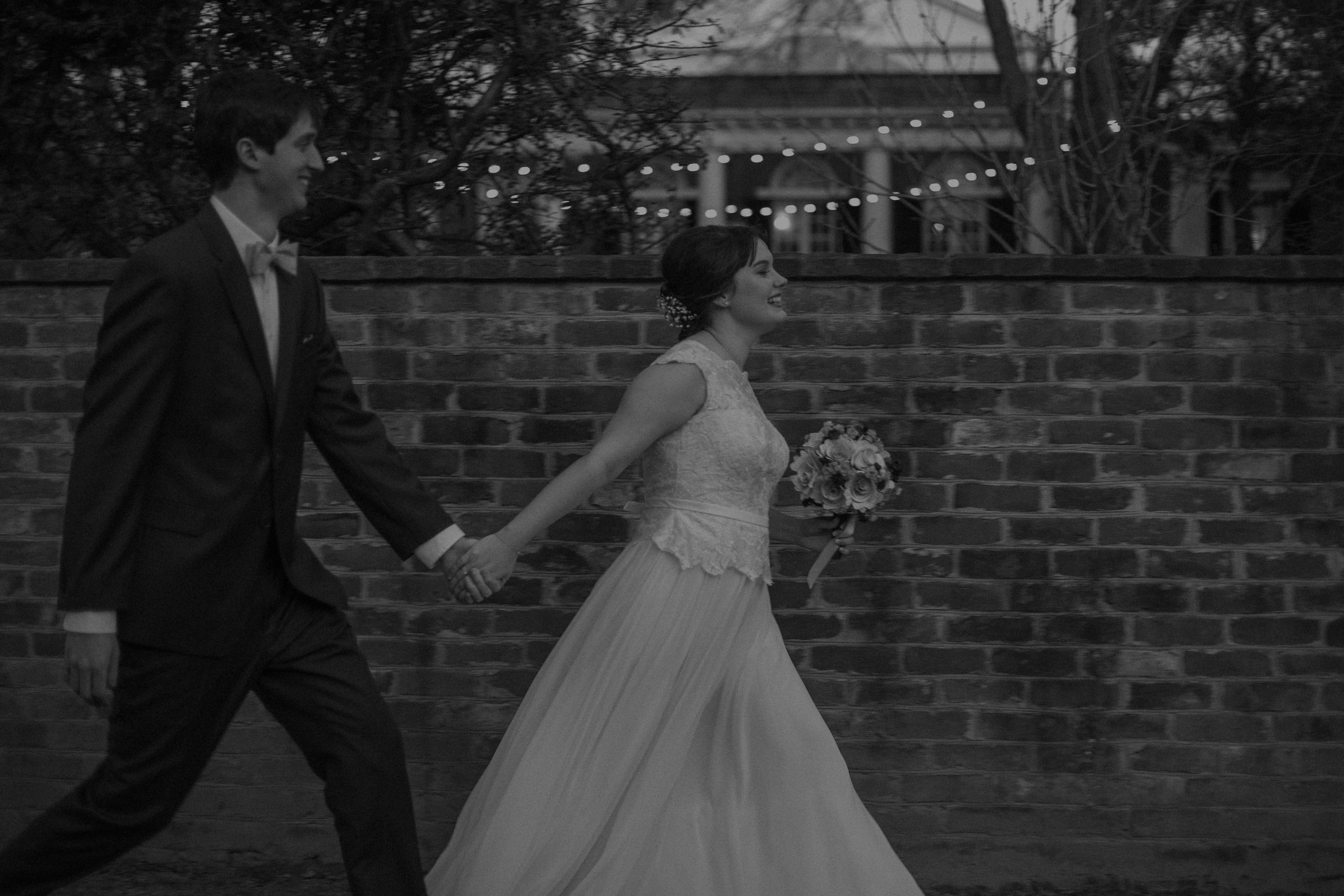 bride and groom blurry running at colonnade club wedding in Charlottesville Virginia - Virginia documentary wedding photography - - fly on the wall style photography