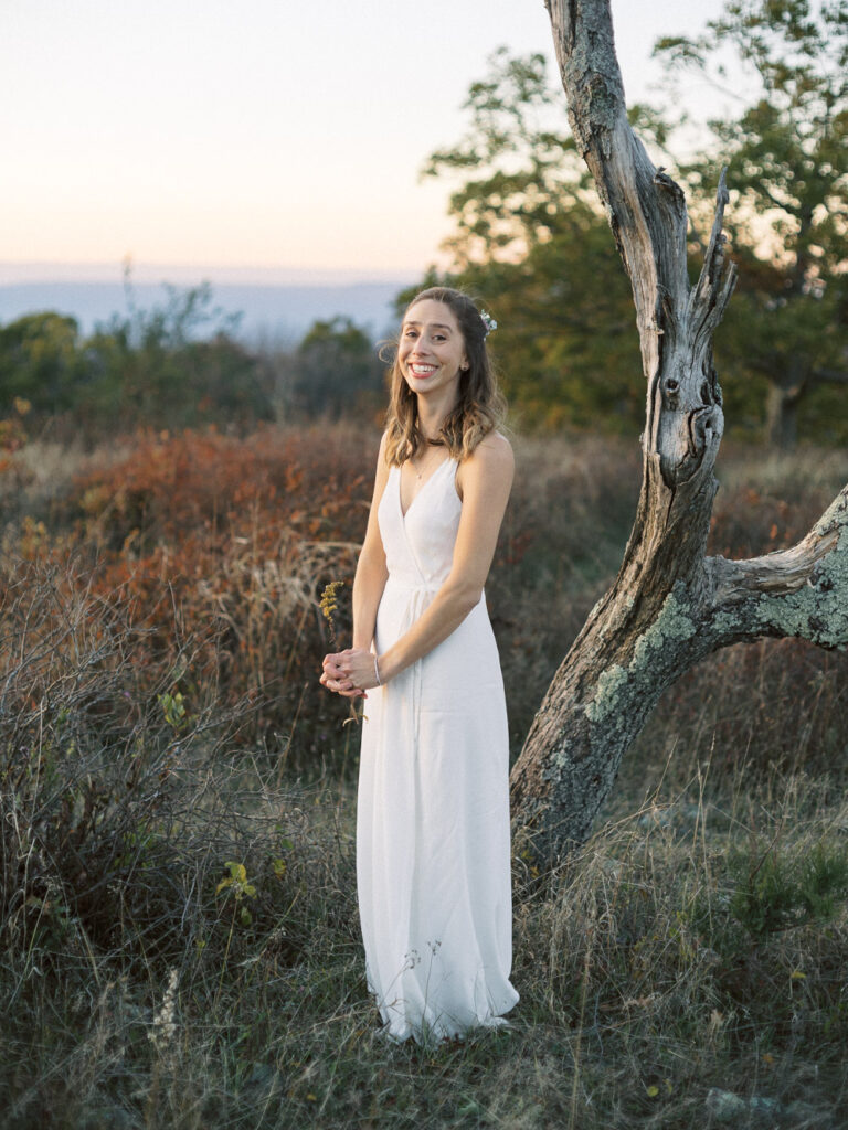 bride laughing at sunset elopement in Big Meadows Virginia - natural edit
