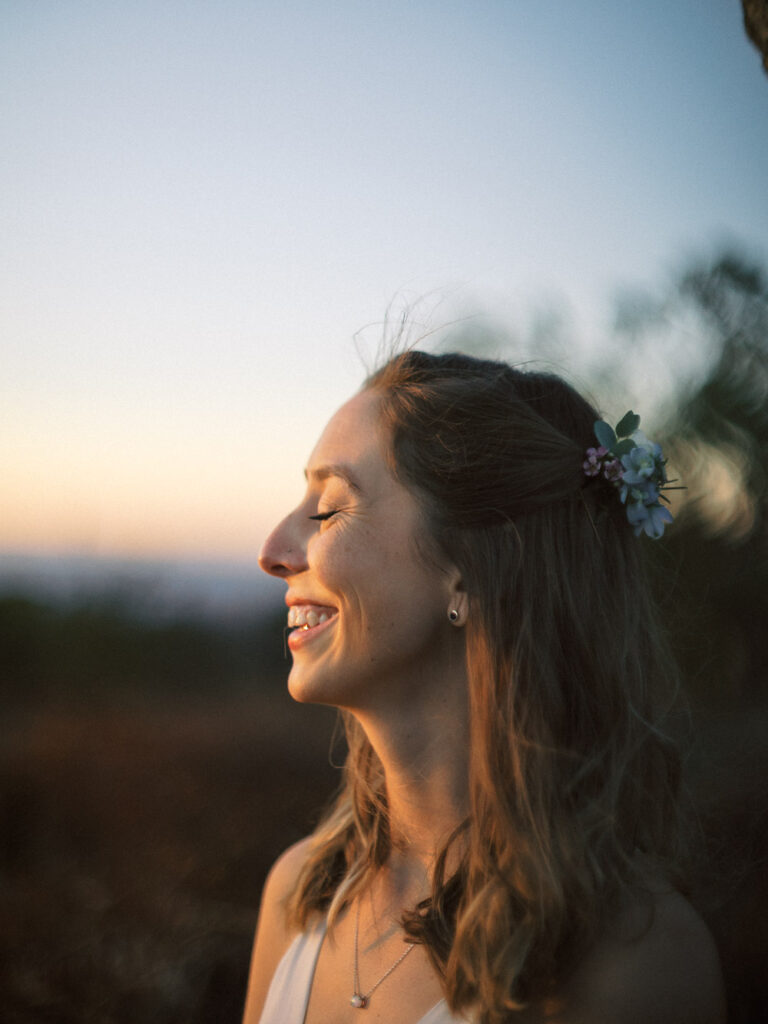 bride laughing in portrait at sunset - Shenandoah National Park elopement - natural film based edit