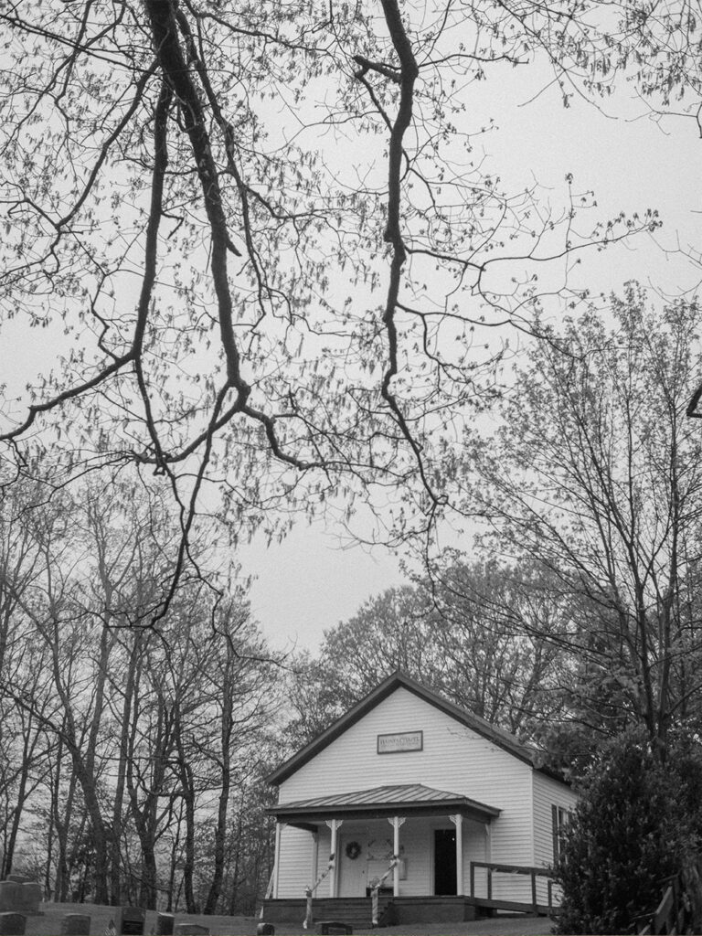 black and white photograph of Haines chapel on rainy day - Ilford HP5+