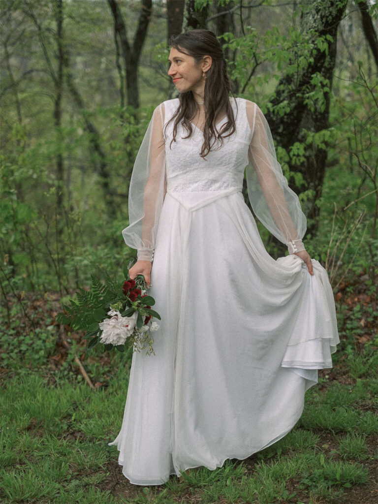 bride posing in homemade wedding dress on overcast day - natural edit