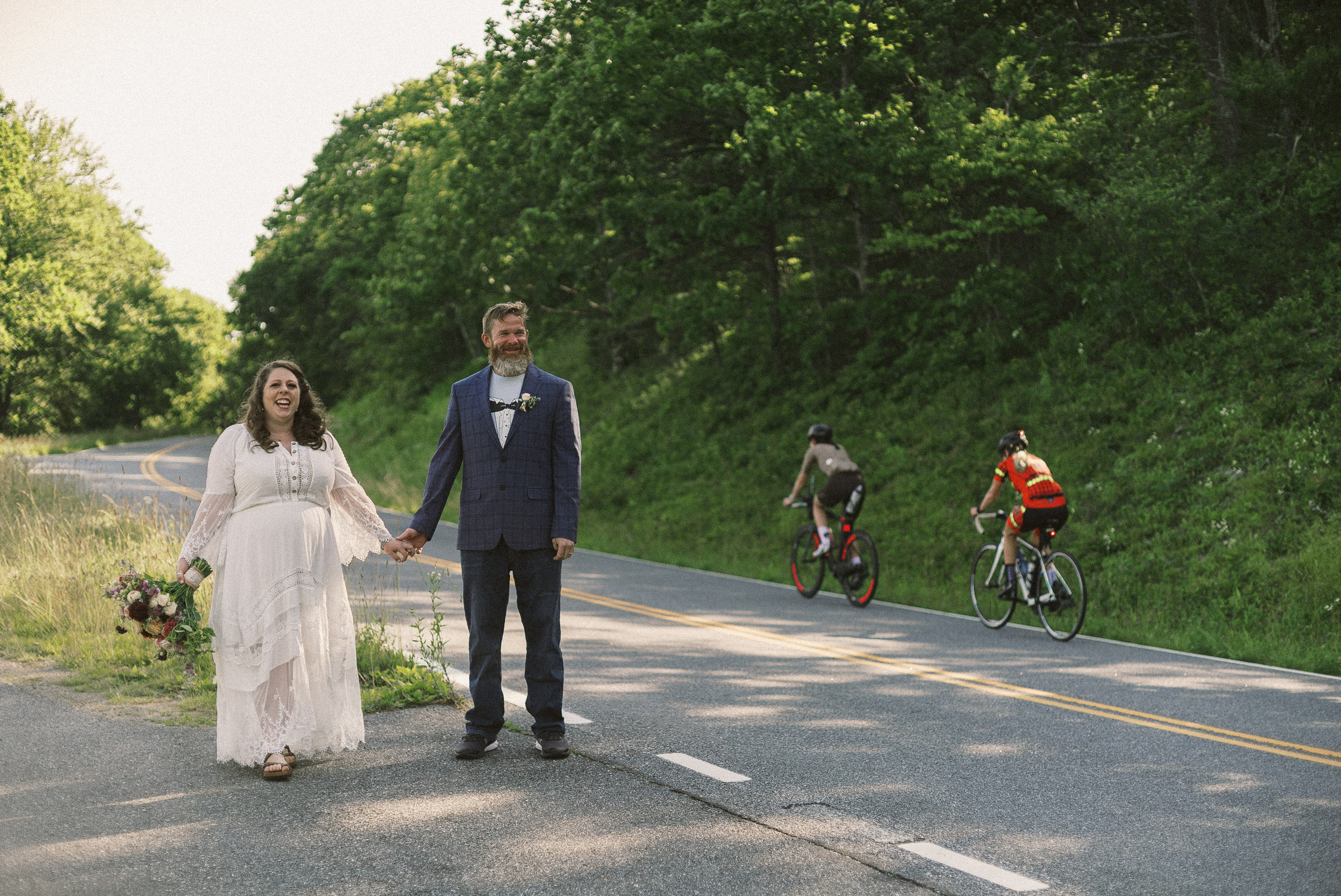 bride and groom environmental wedding portrait along Skyline Drive in Shenandoah National Park - captured by Virginia documentary wedding photographer - fujifilm classic wedding photo