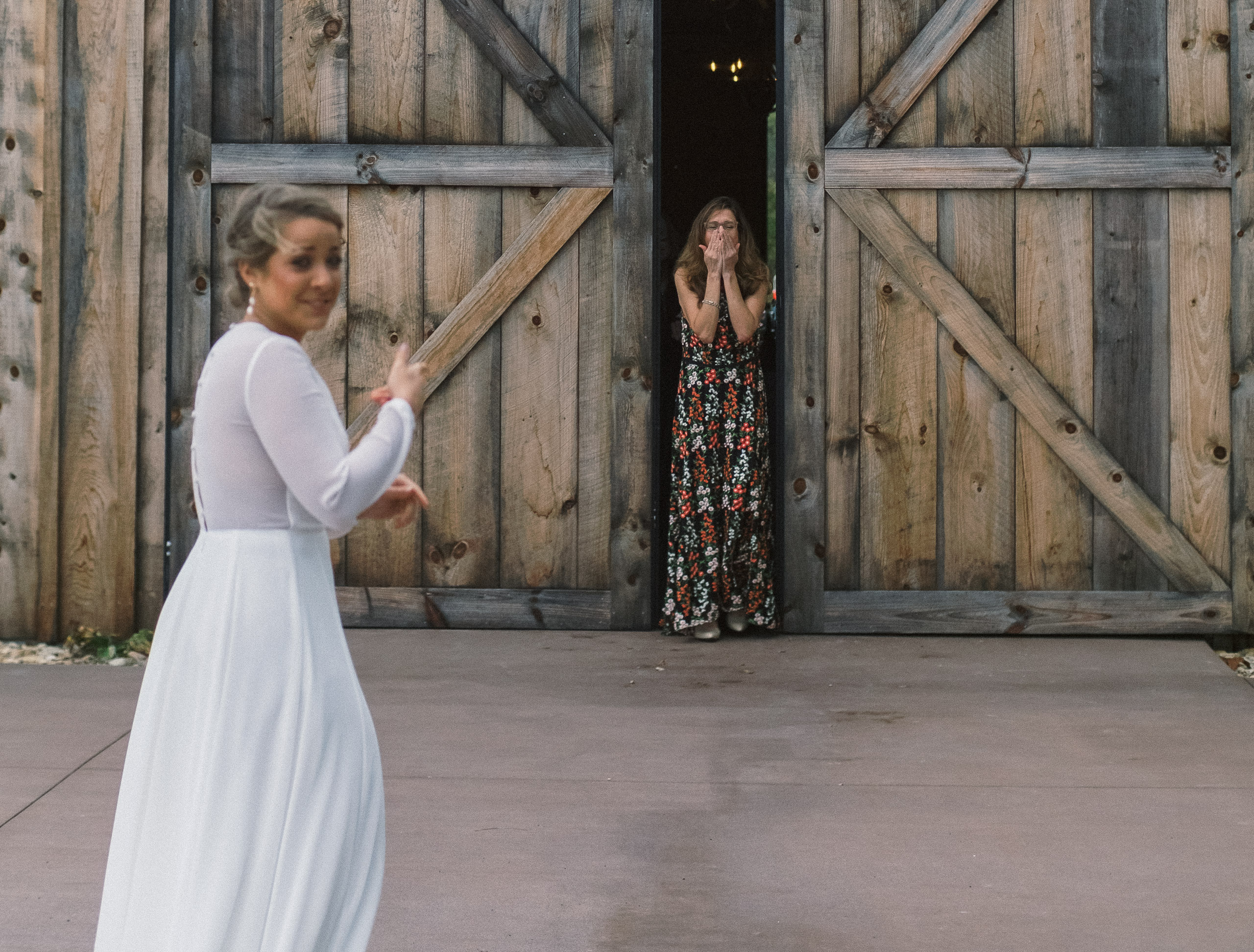 mother sees bride before wedding accidentally - accidental surprise first look - captured by Virginia documentary wedding photographer - fujifilm classic wedding photo