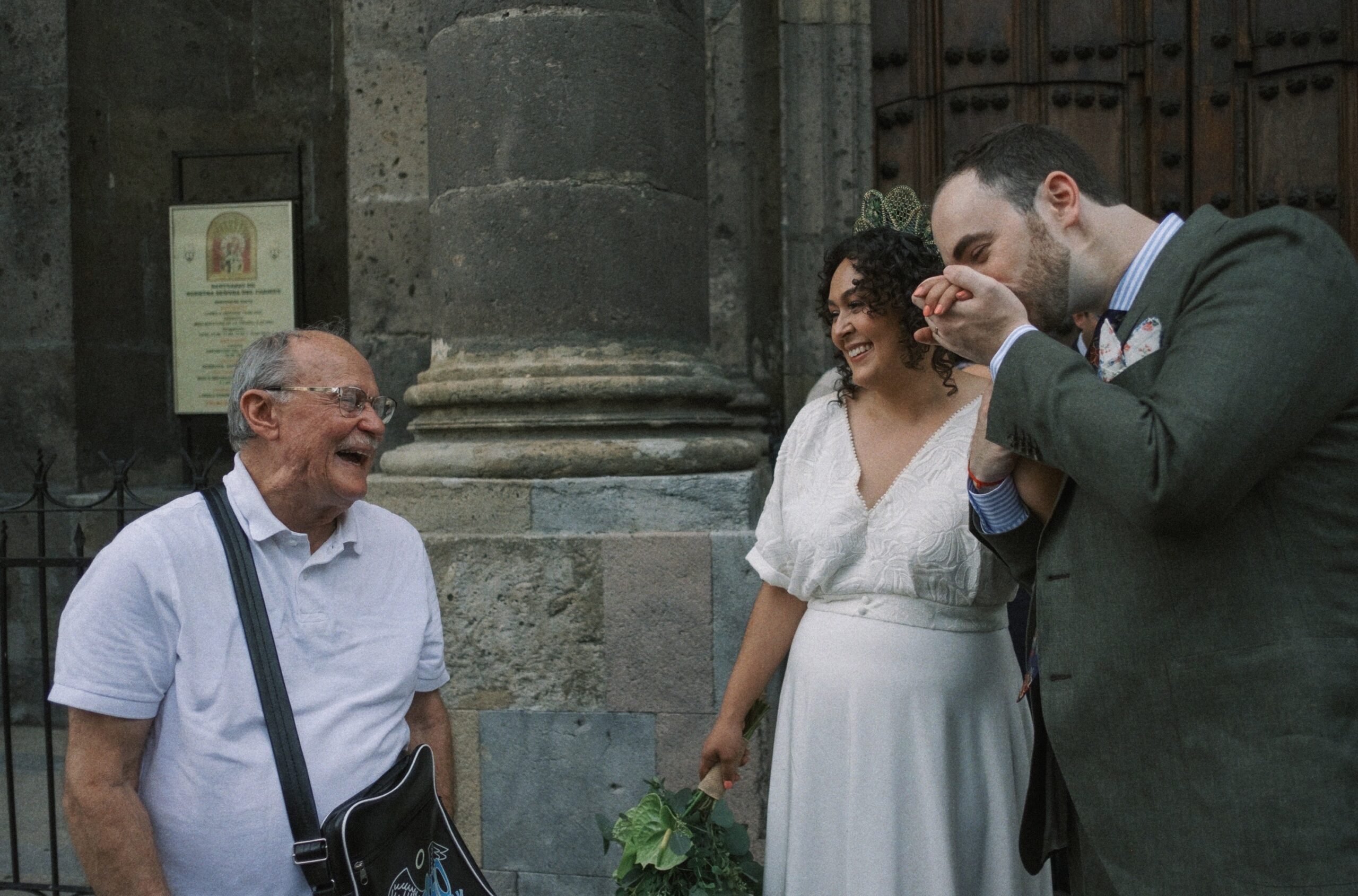 priest congratulates bride and groom after getting married in Guadalajara Mexico - captured by documentary wedding photographer - fujifilm classic wedding photo