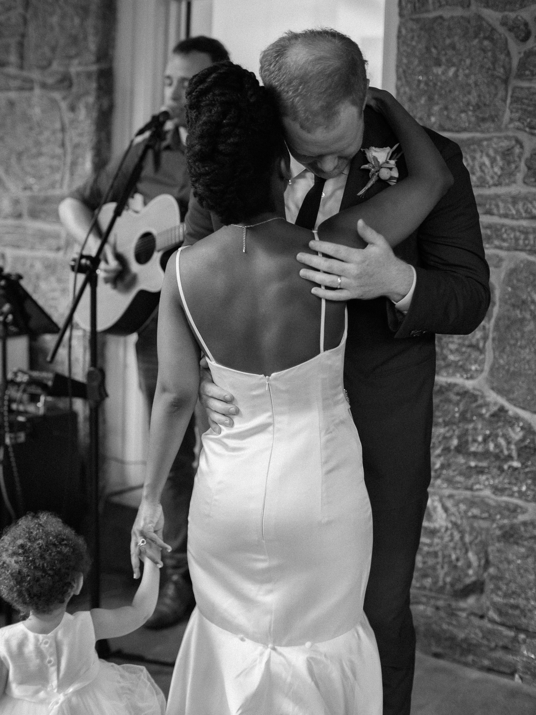 bride and groom dancing with daughter at asbury arboretum Philadelphia - documentary wedding photography - - fly on the wall style photography